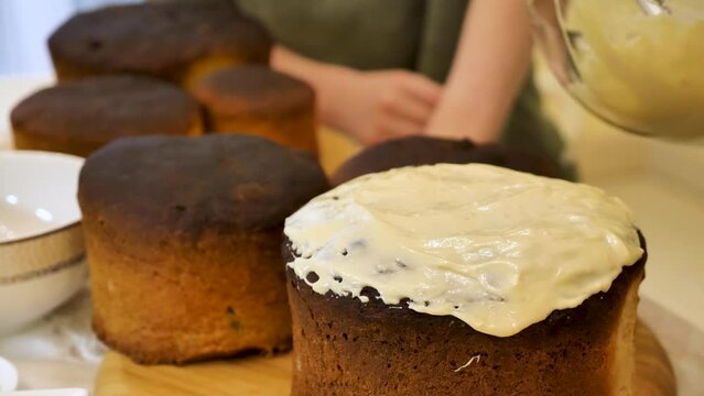 the process of making traditional easter bread cake. step- by-step instructions on preparing the dough, shaping the loaves, and baking the Kulich. 