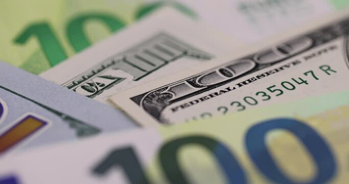 cash one hundred euros and 100 dollars close-up, genuine cash from the European Union and the USA