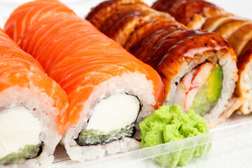 Close Up of Assorted Sushi Rolls with Fresh Wasabi