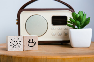 Fototapeta premium Morning Mood Boosters: Coffee and Sunshine Icons with Radio