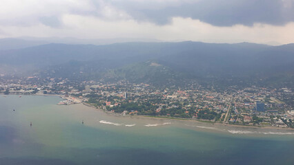 Naklejka premium Aerial panoramic view of the capital city of Dili in Timor-Leste, Southeast Asia 