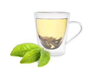Green tea in glass cup and green leaves isolated on white