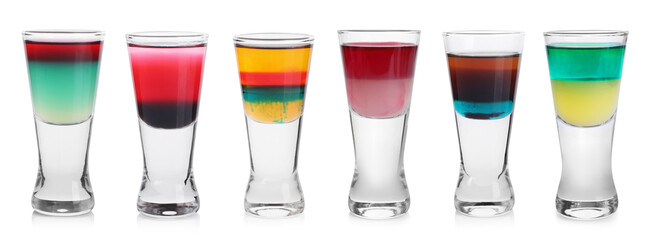 Different shooters in shot glasses isolated on white, set