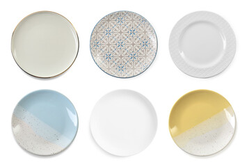 Different clean plates isolated on white, top view
