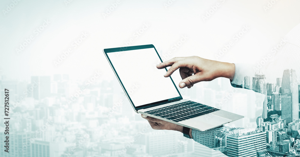 Poster double exposure image of businessman using computer on abstract modern city background. future busin