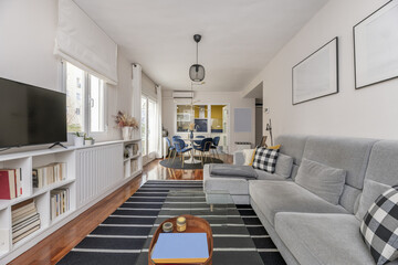 A living room with contemporary decoration with white furniture