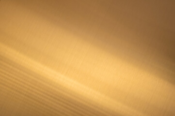 Wall interior background, studio and backdrops show products.with shadow from window color gold background for text insertion and presentation product	
