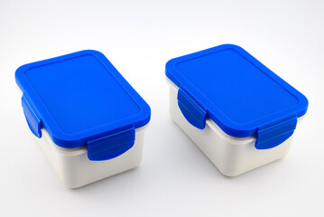 two white food plastic containers with blue lid for lunch