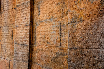 An Ancient Tamil Letters Inscription or Vattezhuthu or grantha script at Tanjore Big Temple or Brihadeshwara Temple was built by King Raja Raja Cholan, Tamil Nadu. This is UNESCO's Heritage Site.