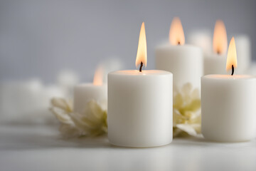 Fototapeta na wymiar white lit candles on the table