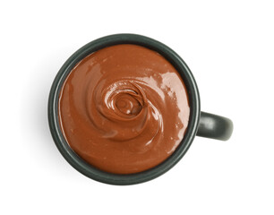 Cup of tasty melted chocolate on white background