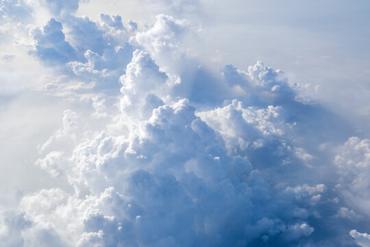 Above view of white fluffy clouds © Regis