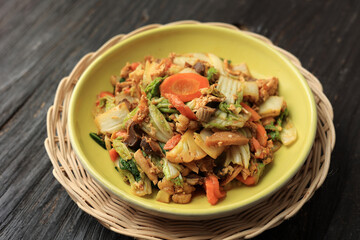 Capcay Goreng Close Up on Wooden Table.