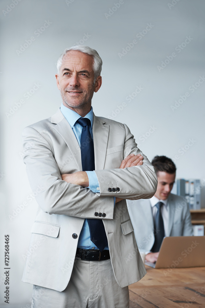 Wall mural Senior businessman, professional and confidence in leadership, agency and pride for mentoring in office. Male person, arms crossed and smile for support in management, advisor and laptop for planning