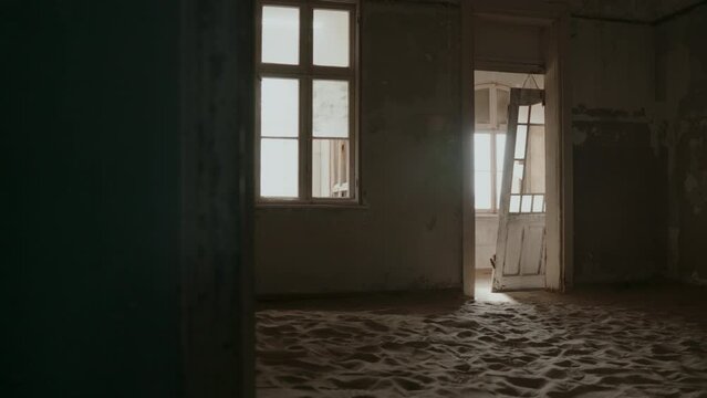 Broken doors in an old, eerie house.