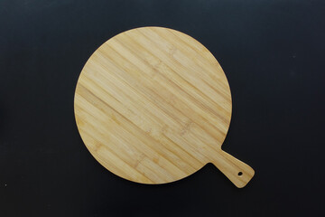 wooden chopping board on table with copy space 