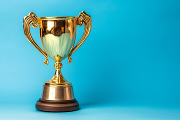 a golden trophy on the blue background
