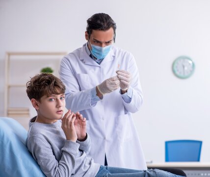 Young boy visiting doctor in hospital