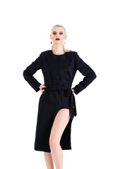 Fototapeta premium Beautiful girl in a black dress in the studio. Beautiful woman body.