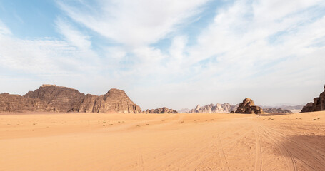 The indescribable magnificence of the vast expanses of the endless sandy red desert of the Wadi Rum...