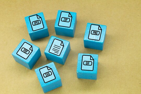 blue wooden square with jpeg, svg, png, pdf, gif and zip file icons. the most common file formats and discuss what makes them unique