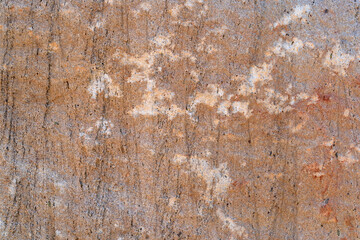 Fototapeta premium old yellow cement wall or ancient stain brown surface peel off to rough concrete table or ground on top view for dirty texture floor background or retro backdrop antique construction vintage wallpaper