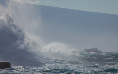 Incredibly powerful ocean waves crashing into the shore