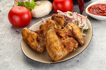 Grilled chicken wings with sauce