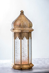 Beautiful Moroccan lantern lamp isolated on white colour background, Ramadan Kareem and Eid Mubarak concept background