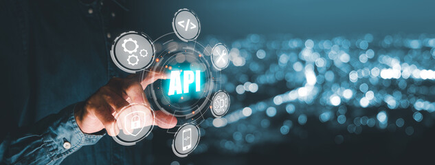 API - Application Programming Interface, Man presses button on touch screen interface and select API icon, Software development tool, modern technology, internet and networking concept. - obrazy, fototapety, plakaty