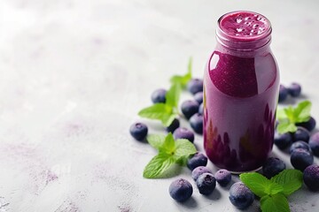 Blueberries and yogurt in a glass jar, a delicious and healthy fruit dessert with fresh, ripe berries, creating a sweet and juicy beverage