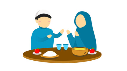 Muslim Family Dining at Their Home. An isolated family gathers around a table to celebrate Eid Mubarak, Sahur, or Iftar evenings, and Ramadan. Muslim family having dinner, Muslim dressed.