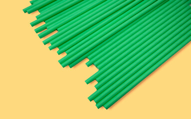 Green paper straws pattern textures background. Eco friendly concept. 