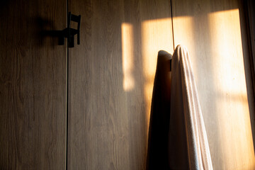 Towel As Hanging In Front Of The Closet