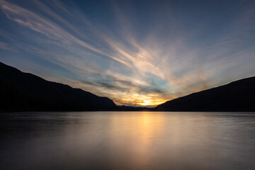 long exposure of sunset at a lake in the mountains