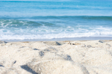 Background with sea shore ocean and sans shore,copy space backdrop.Sunlight, bright sun, summertime.Tourism,vacation concept