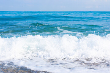 Natural background with oceanside sea waves with ащфь.Shore with copy space,tourism,vacation