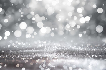 Bokeh; Silver and white light orbs on grey.