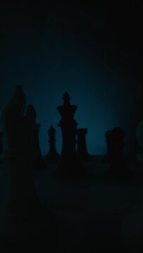 mysterious chess game in darkness with smoke, turning lights on and revealing the main character on the battlefield
