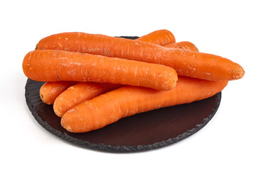 Fresh unpeeled organic carrot, isolated on white background.