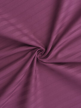 fragment skruchennoy tkani. strayp-satin, makro