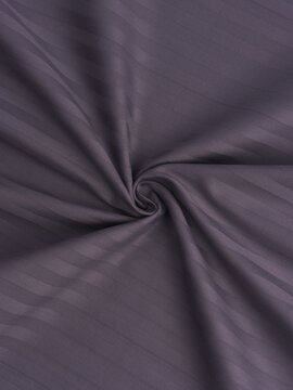 stripe satin in folds. example of fabric pattern and color