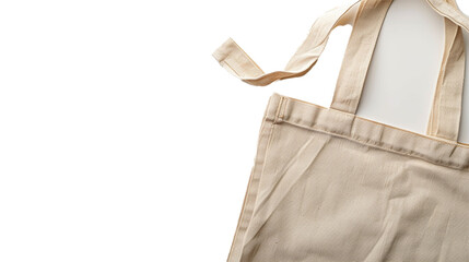 A soft beige fabric tote bag on a white solid background. 