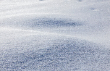 A foreground with snow dunes