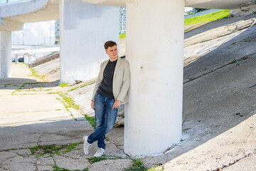 Young man in stylish clothes outdoors