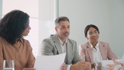 Happy busy executive team, diverse office workers people having business meeting, consulting client, hr recruiting group having onboarding interview, providing consultancy services in office.