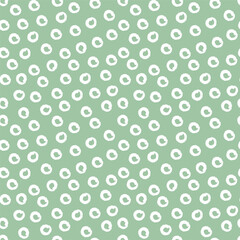 Random circle spots, abstract minimalistic retro background. Seamless vector pattern with rounded stains. Monochrome simple green vector illustration.