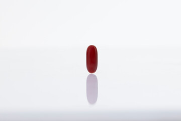 Brown pill on white background