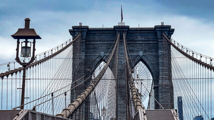 The famous and wonderful Brooklyn Bridge linking the boroughs of Manhattan and Brooklyn in New York...