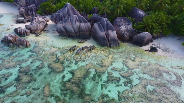 Aerial view of anse source d'argent beach on a sunny day, Seychelles
